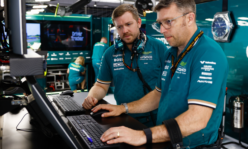 Aston Martin F1 team engineers at a Grand Prix