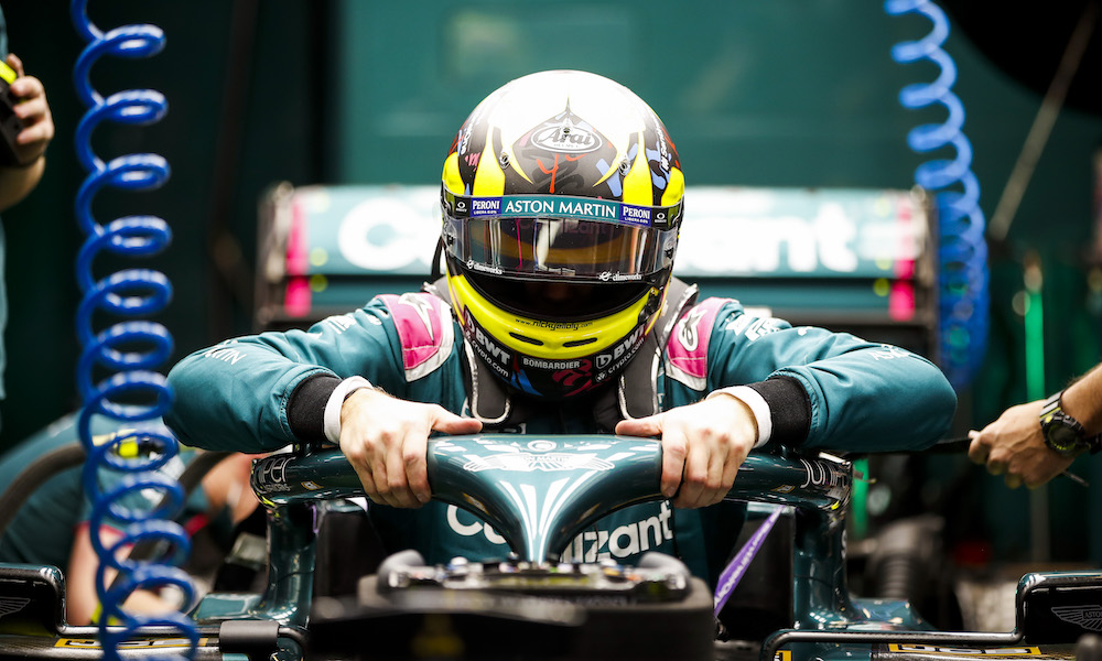 Aston Martin F1 simulator driver, Nick Yelloly, gets into an Aston Martin AMR21 during a test at Yas Marina Circuit, Abu Dhabi